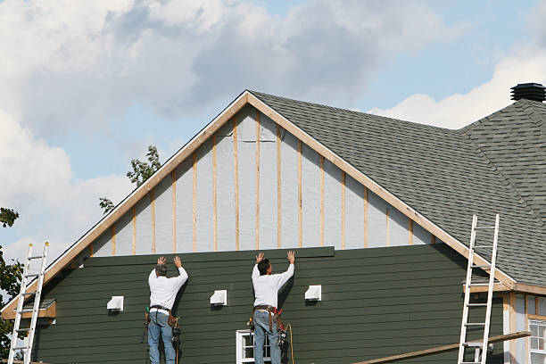 Professional Siding Contractor technician working in Brookville, IN